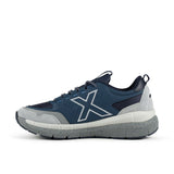 Zapatilla Munich Kava 41750 azul marino vista lateral exterior con X blanca
