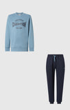 Conjunto Champion junior 307263 con sudadera azul claro y pantalón azul marino