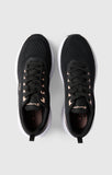 Vista trasera del talón con tirador de las Champion Alpha Max Low negras de mujer