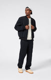 Chaqueta Bomber Champion Negro – Estilo Urbano, Ligera y Deportiva