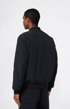 Chaqueta Bomber Champion Negro – Estilo Urbano, Ligera y Deportiva