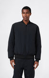 Chaqueta Bomber Champion Negro – Estilo Urbano, Ligera y Deportiva