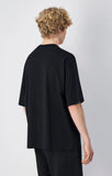 Camiseta Champion Icons Logo Bordado Grande Negro – Fit Oversize (Talla una menos de lo habitual) - Puber Sports